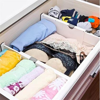 Obrázek z Nastavitelný rozdělovač/přepážka do zásuvky