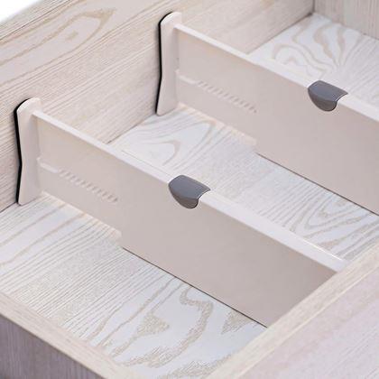 Obrázek z Nastavitelný rozdělovač/přepážka do zásuvky